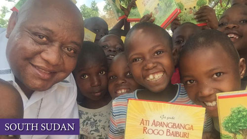 kids with Bible story books in South Sudan